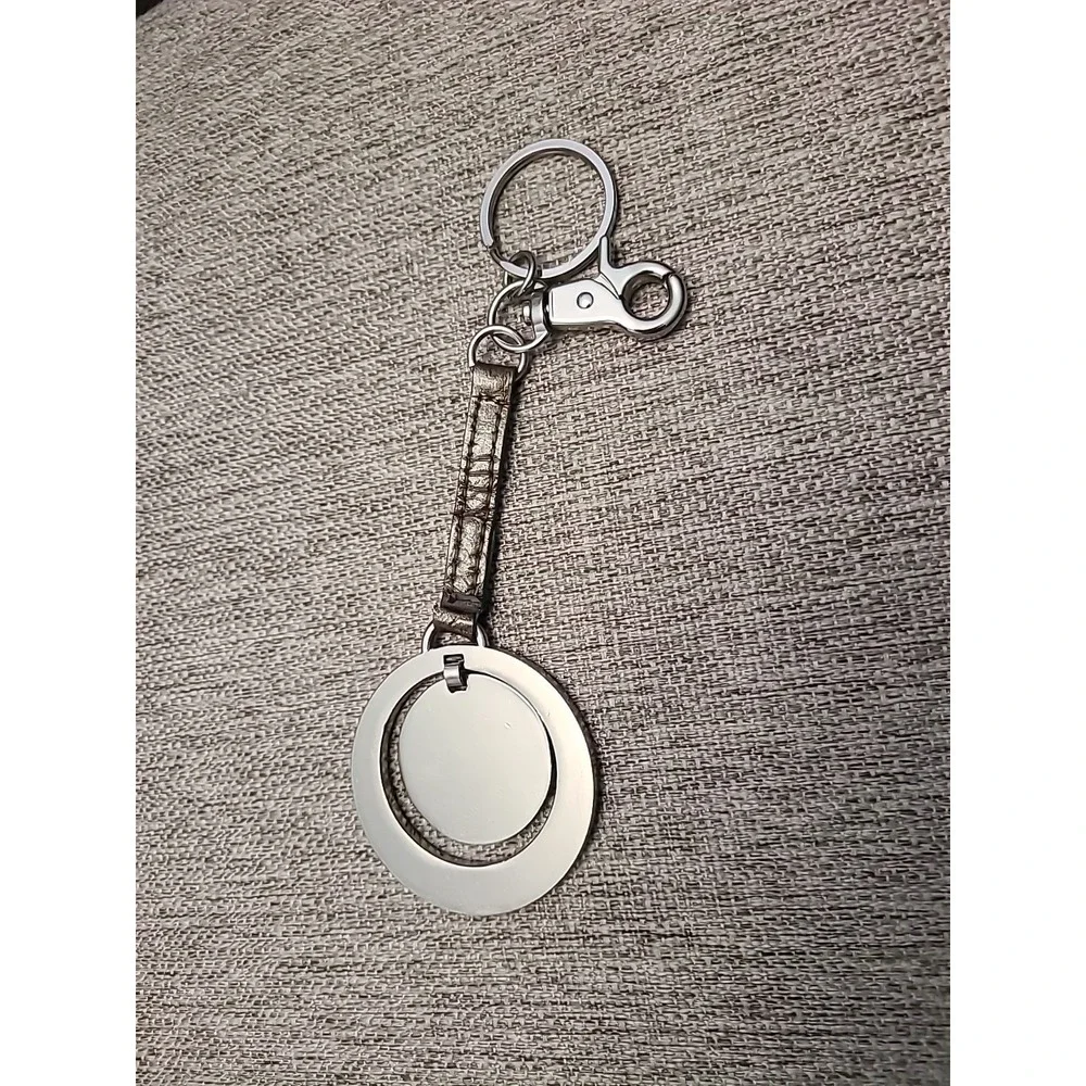 NWOT Kathy van Zeeland Silver Bag Charm Keychain Purse Clip